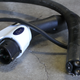Ford charger (left) vs. Tesla charger (right). Photo credit: Stef Schrader